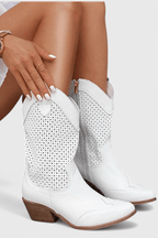 White perforated western boots with buckle strap and block heel