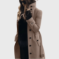 Women’s beige button-front long coat with high stand collar and long sleeves
