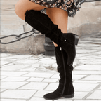 Black knee-high slouch boots with low block heel and side button detail
