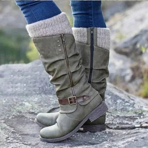Women’s gray winter boots with knit cuff, side zipper, and buckle strap