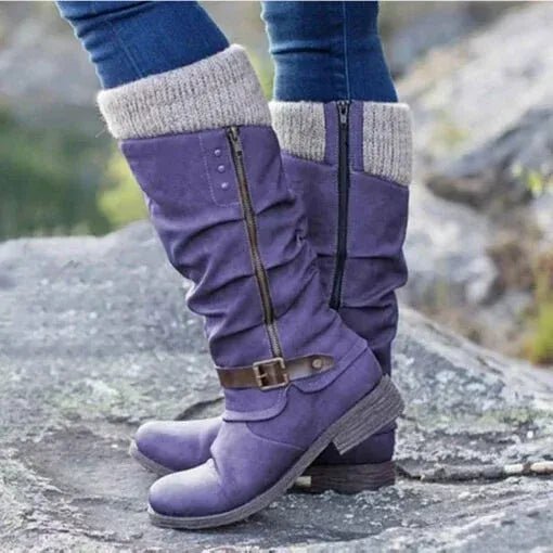 Women’s purple winter boots with knit cuff, side zipper, and buckle strap