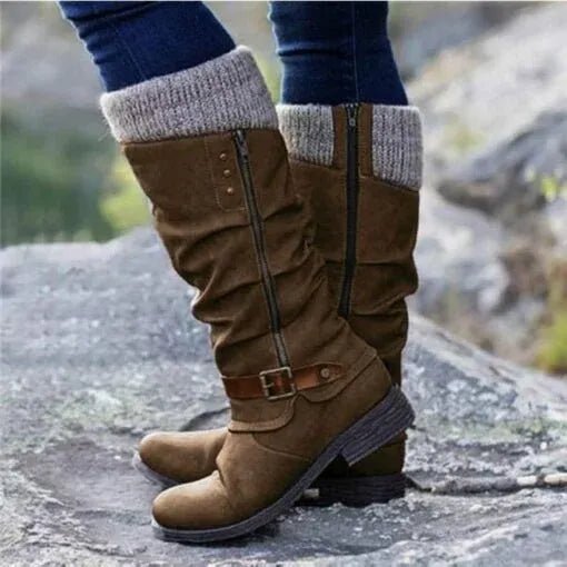 Women’s brown winter boots with knit cuff, side zipper, and buckle strap