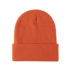 Orange knitted beanie with ribbed fold-over brim