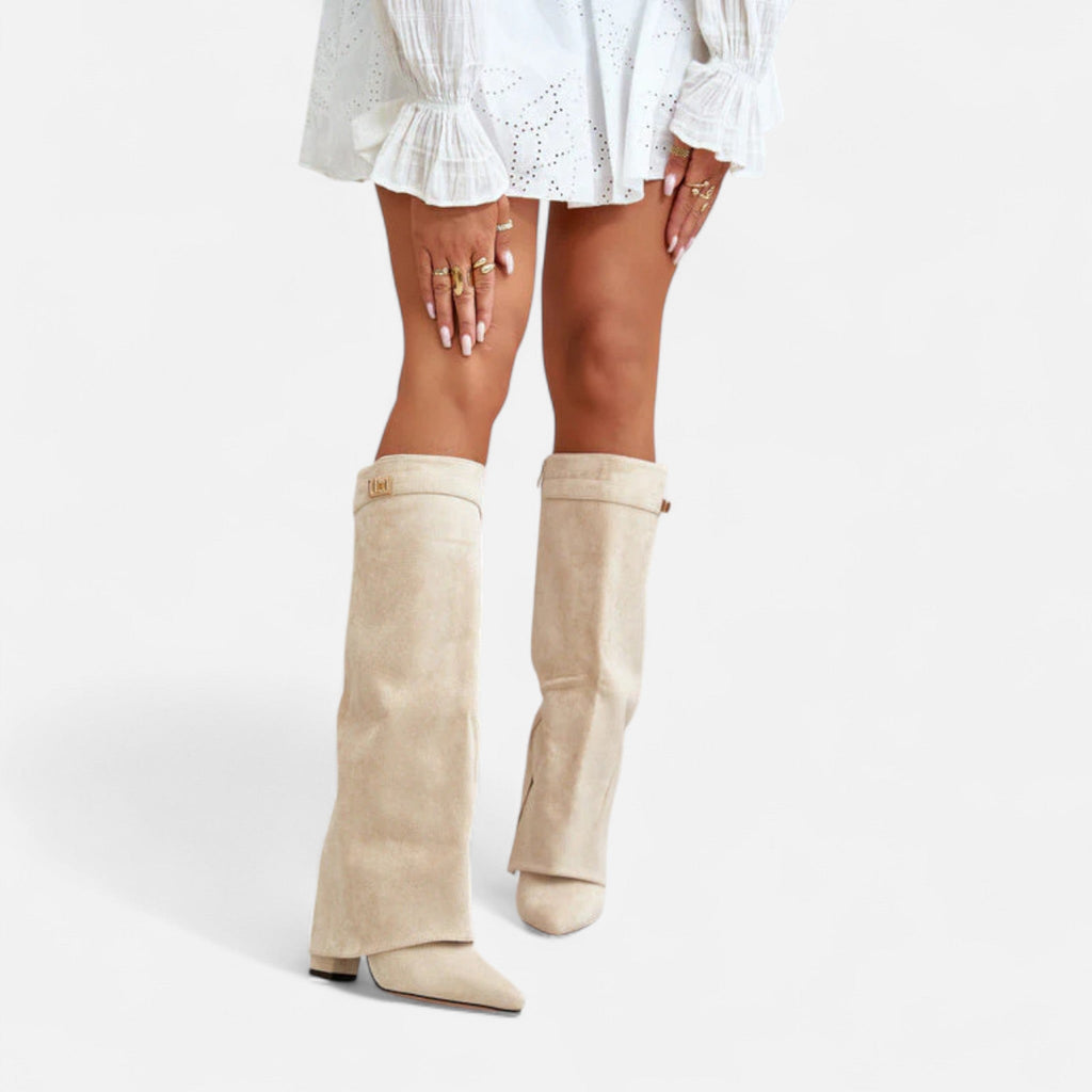 Beige knee-high suede boots with buckle strap and pointed toe, mid block heel
