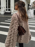 Light brown chunky knit cocoon sweater, wide sleeves, textured cable stitch