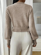 Women’s wrap sweater (light brown) with tie belt, long sleeves; ribbed cuffs