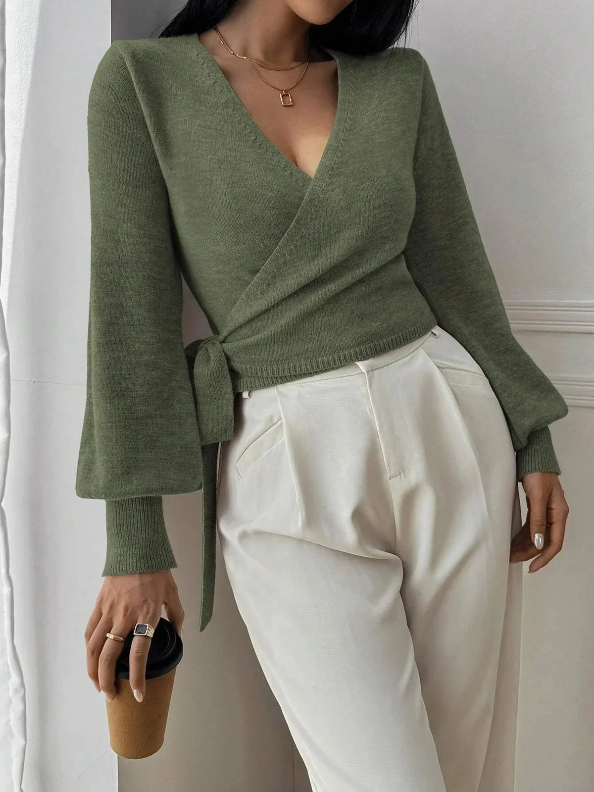 Women’s wrap sweater (green) with tie belt, V-neck; long sleeves and ribbed cuffs