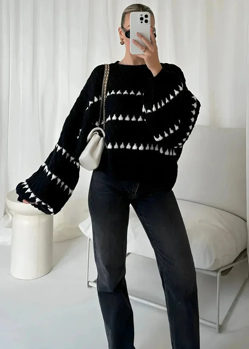 Textured knit sweater, black with white geometric stripe pattern, cropped length