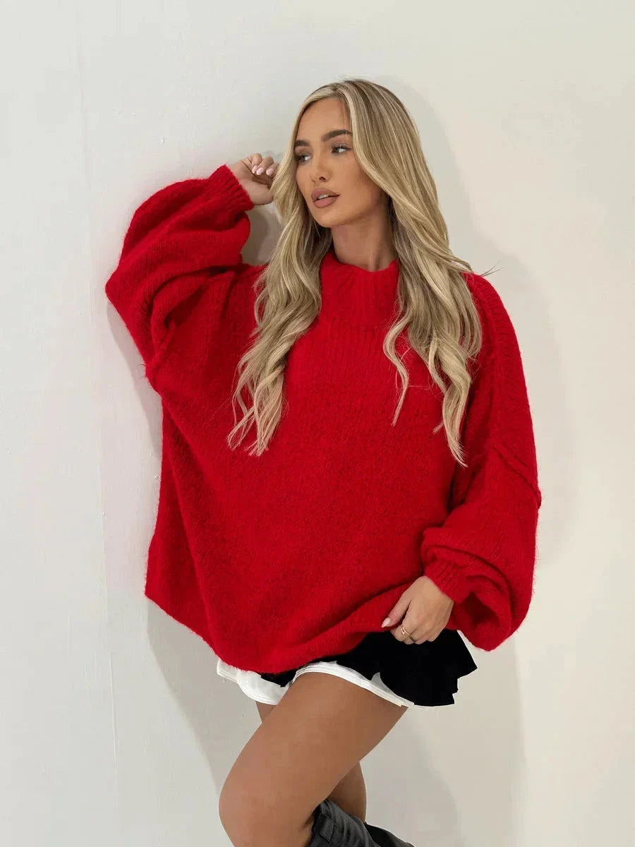 Red loose turtleneck sweater with ribbed neck and oversized long sleeves