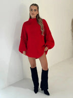 Red loose turtleneck sweater with long sleeves and oversized relaxed silhouette