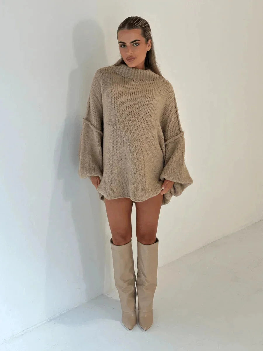Loose women's knit turtleneck sweater with oversized fit and long sleeves, beige