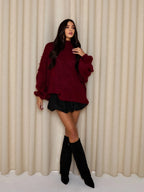 Burgundy loose turtleneck sweater with long sleeves and relaxed fit