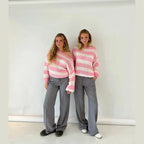 Pink and cream striped cropped knit sweater with wide neckline