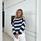 Blue and cream striped knit sweater with crew neck and relaxed fit