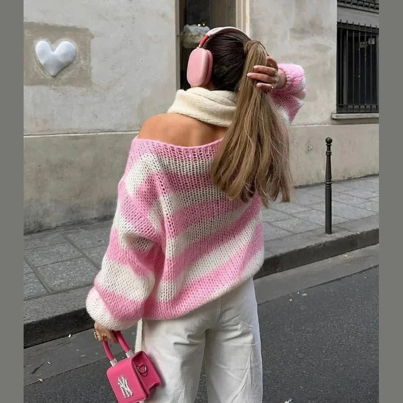 Pink and cream striped off-shoulder knit sweater with long sleeves