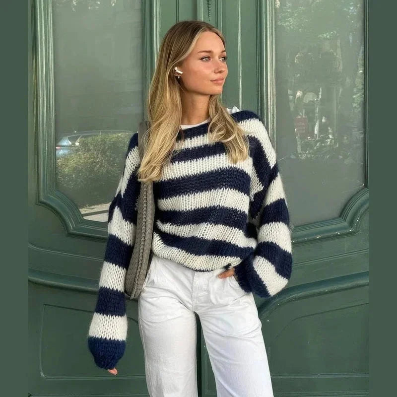 Navy and cream striped knit sweater with wide neckline and long sleeves