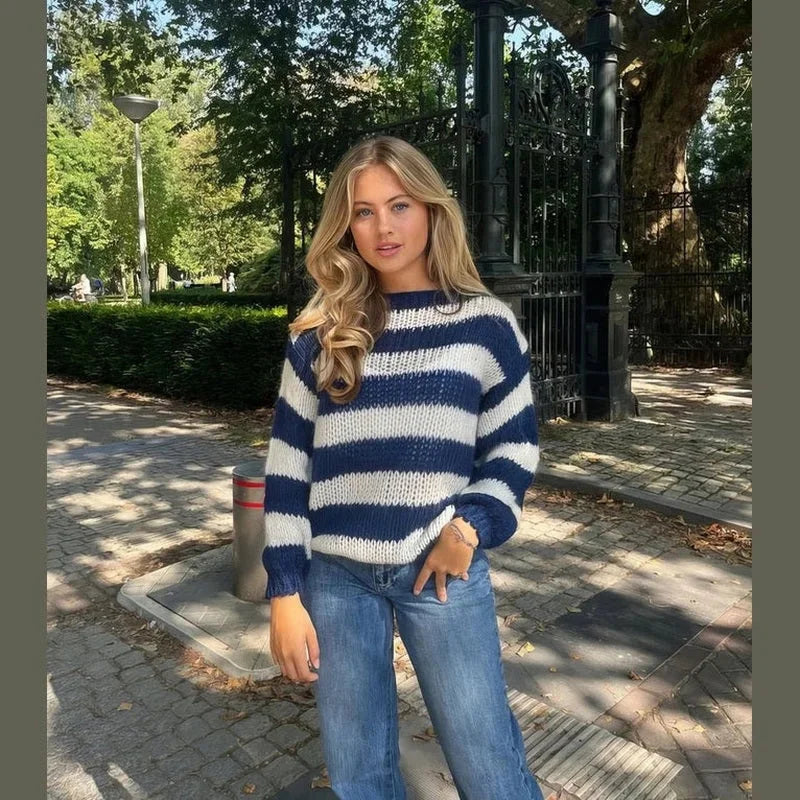 Navy and cream striped knit sweater with crew neck and long sleeves