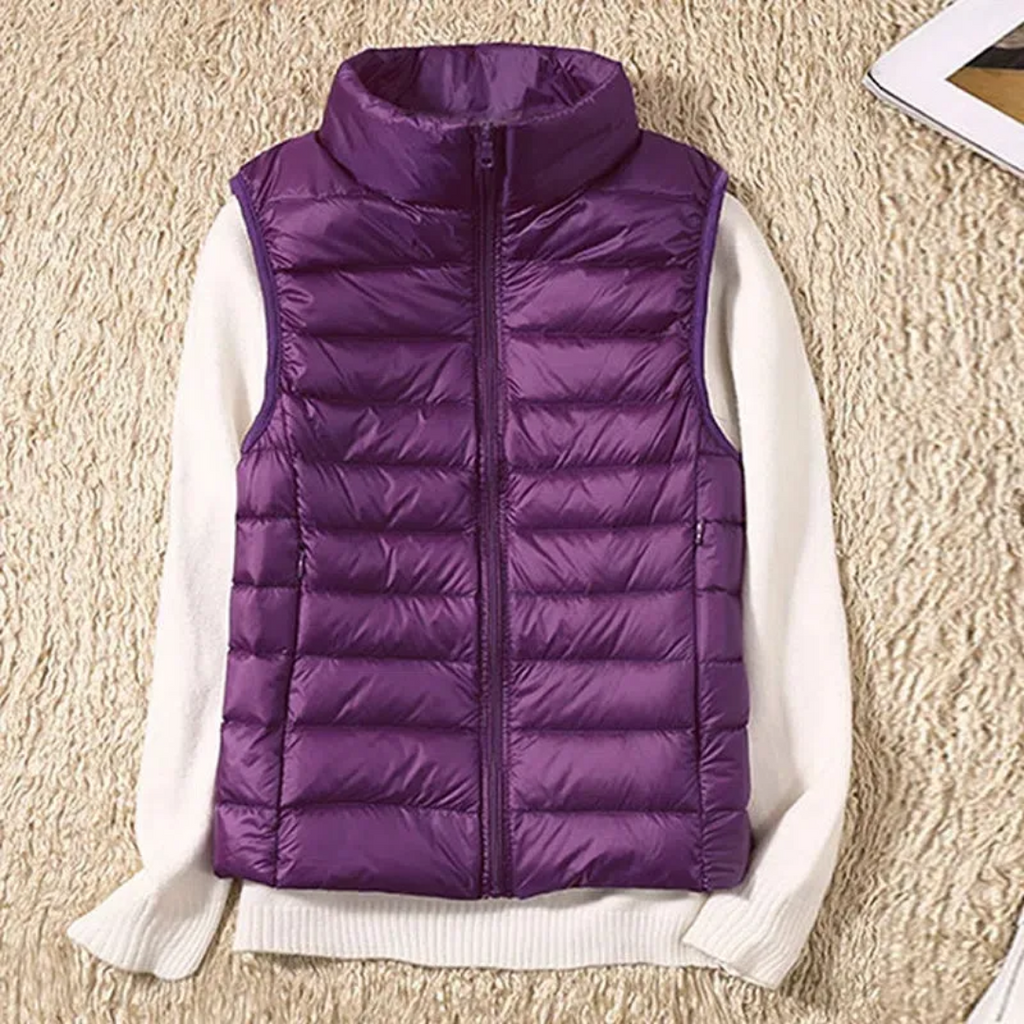Ultralight quilted bodywarmer in purple, sleeveless, full-zip with stand collar