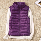 Ultralight quilted bodywarmer in purple, sleeveless, full-zip with stand collar