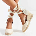 Espadrille wedge sandals with ankle-tie straps, light canvas upper and woven jute wedge