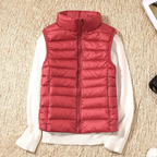 Ultralight quilted bodywarmer in red, sleeveless, full-zip with stand collar