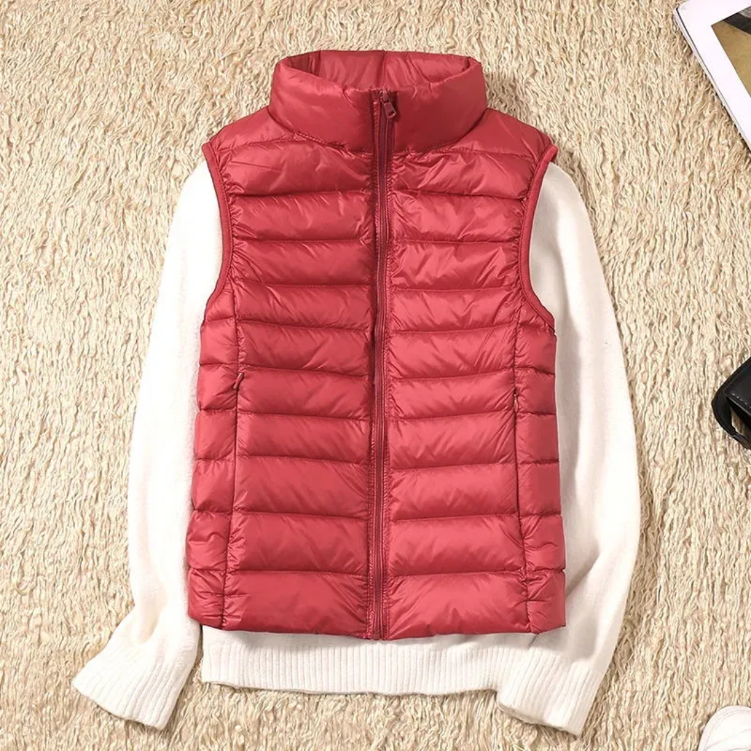 Ultralight quilted bodywarmer in red, sleeveless, full-zip with stand collar