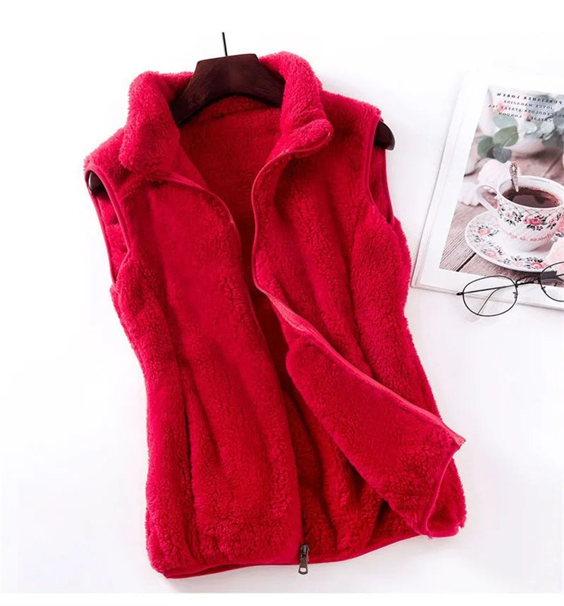 Hot pink fleece bodywarmer vest with zip front and stand collar, sleeveless