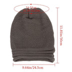 Dark gray knitted beanie with fold-over cuff; shown with size silhouette