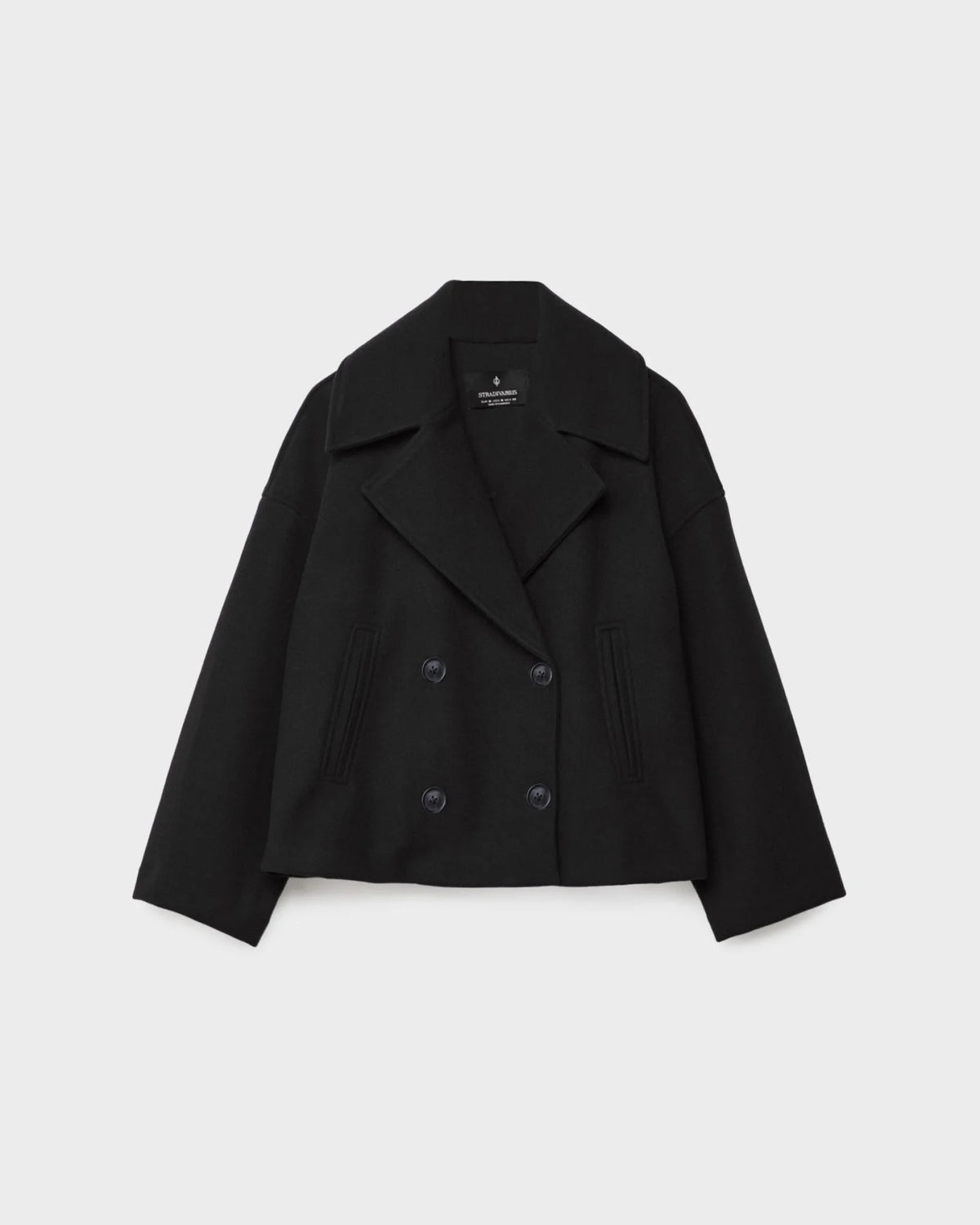 Black short double-breasted wool jacket, front view with notched lapels and buttons