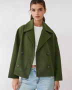 Green short double-breasted wool jacket with flap pockets and silver buttons