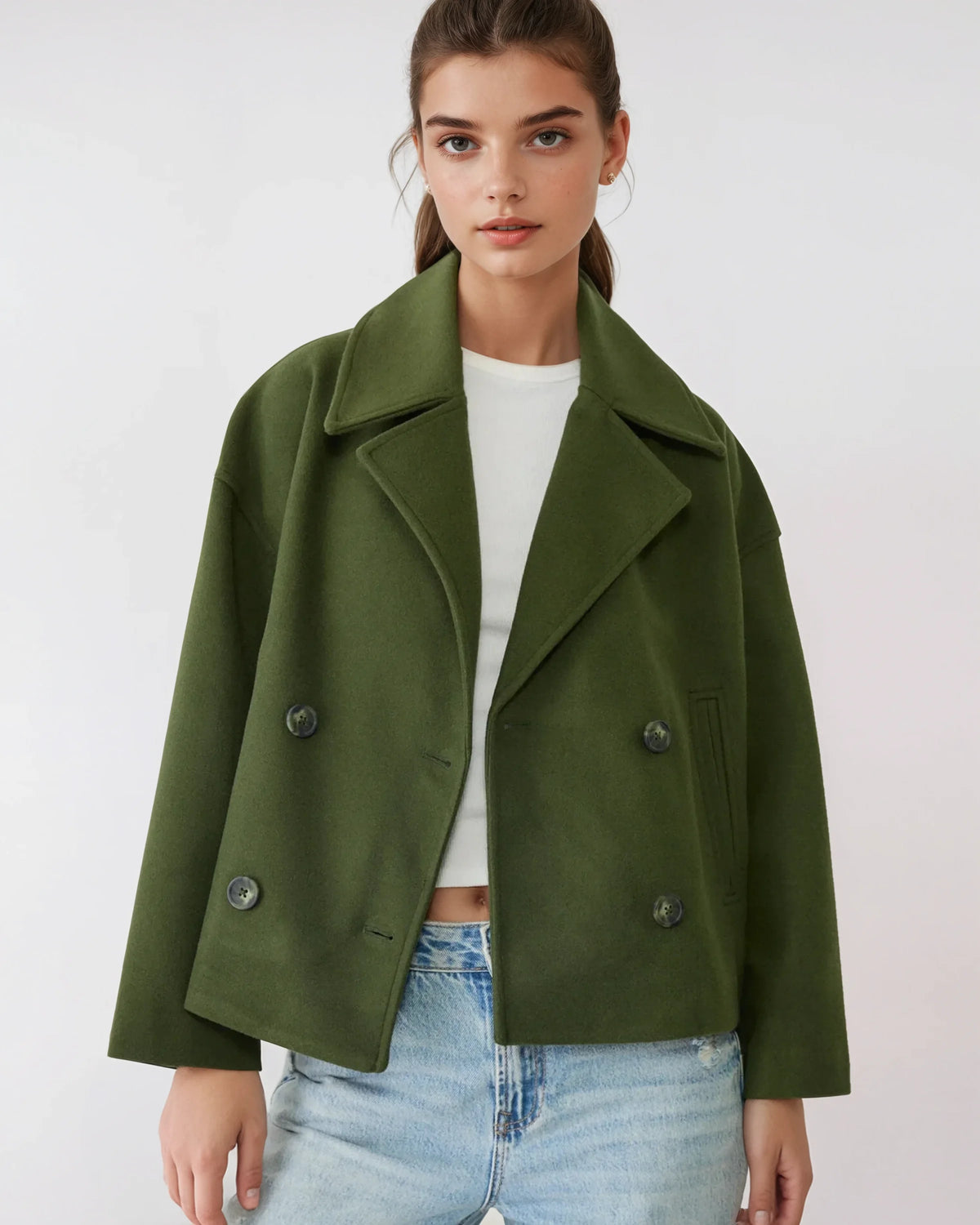 Green short double-breasted wool jacket with flap pockets and silver buttons