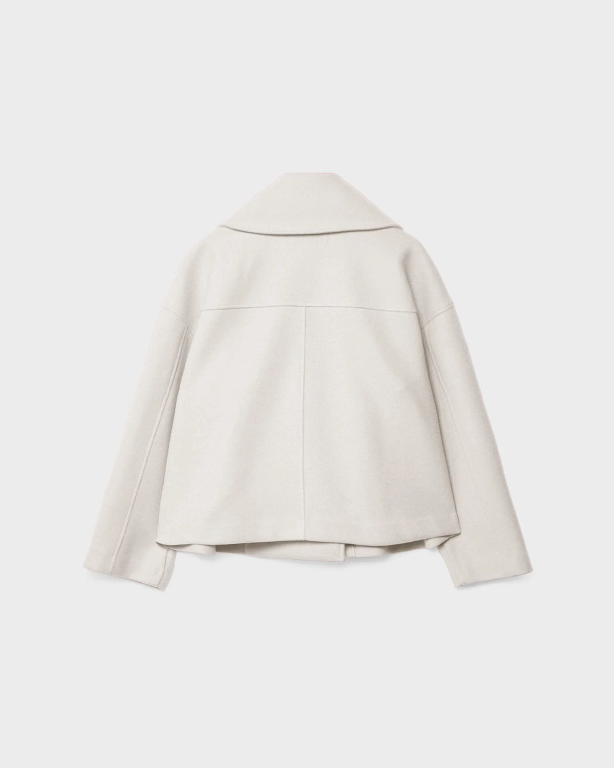 White short double-breasted wool jacket, back view with yoke and center seam