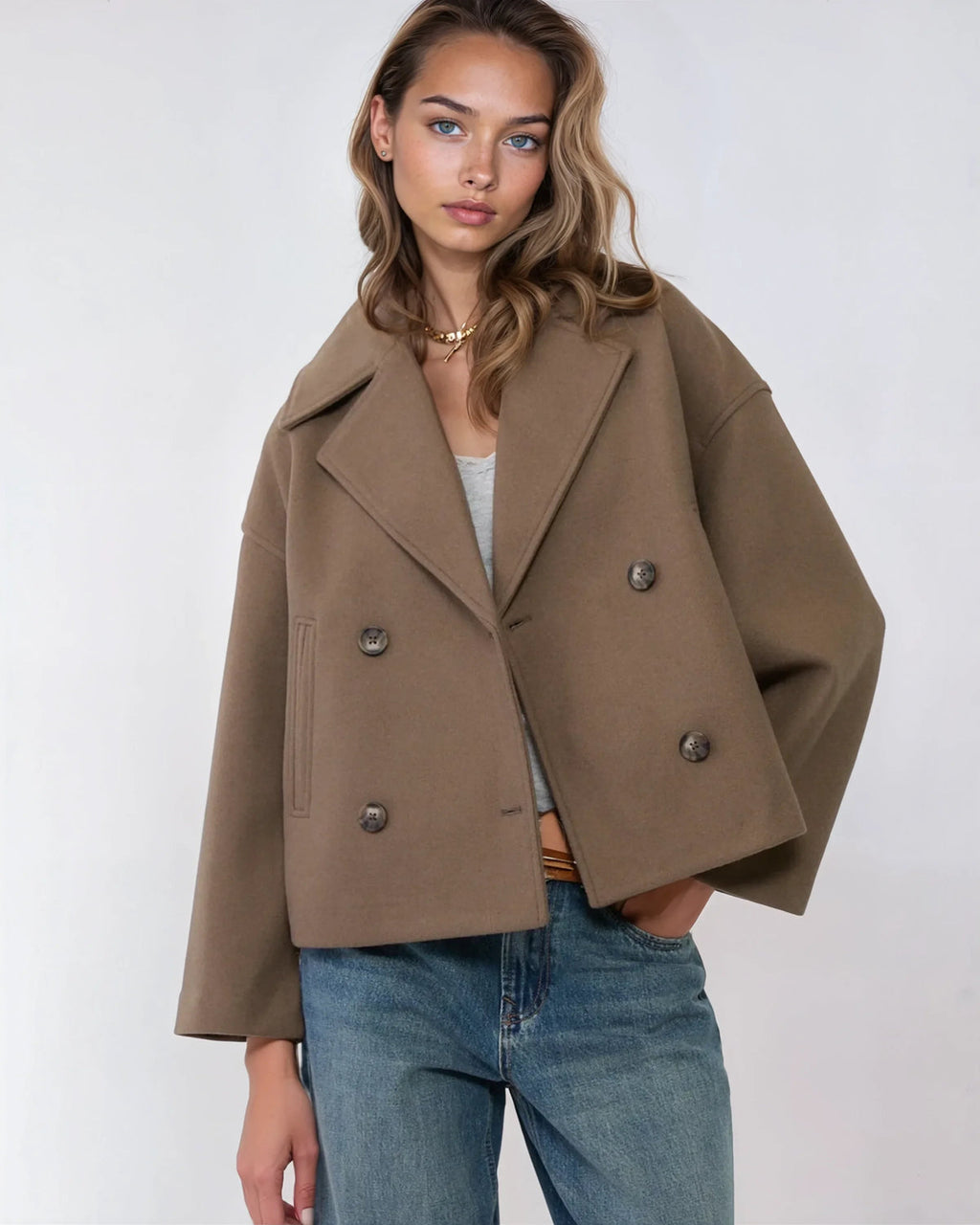 Brown short double-breasted wool jacket with dark buttons and wide lapels