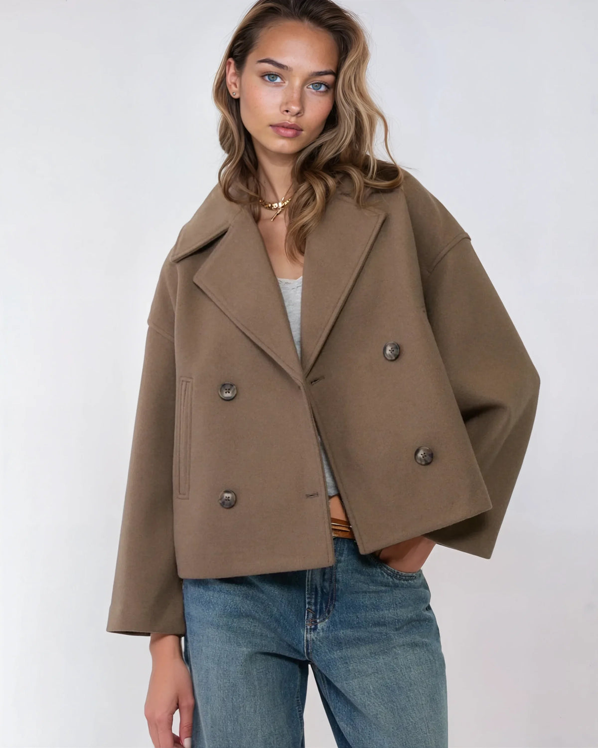 Brown short double-breasted wool jacket with dark buttons and wide lapels