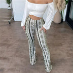 Women’s flared statement trousers with vertical patterned print, high-waist style