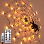 Halloween spiderweb LED string lights with warm bulbs and black spider silhouettes plus remote