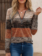Women's striped sweater with quarter-zip, heather tan, charcoal, and rust block stripes