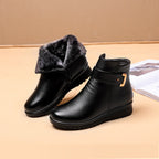Women’s black ankle boots with faux fur collar and side buckle strap
