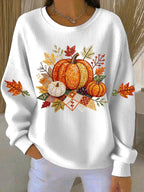 White ribbed women's sweatshirt with fall pumpkin graphic and leaf accents