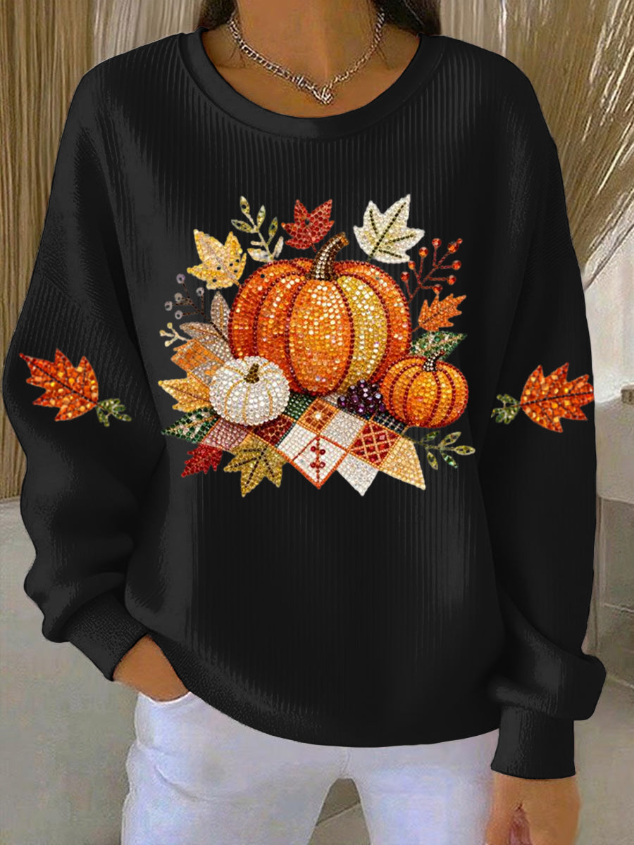 Black ribbed women's sweatshirt with fall pumpkin graphic and leaf accents