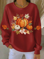 Red ribbed women's sweatshirt with fall pumpkin graphic and leaf accents