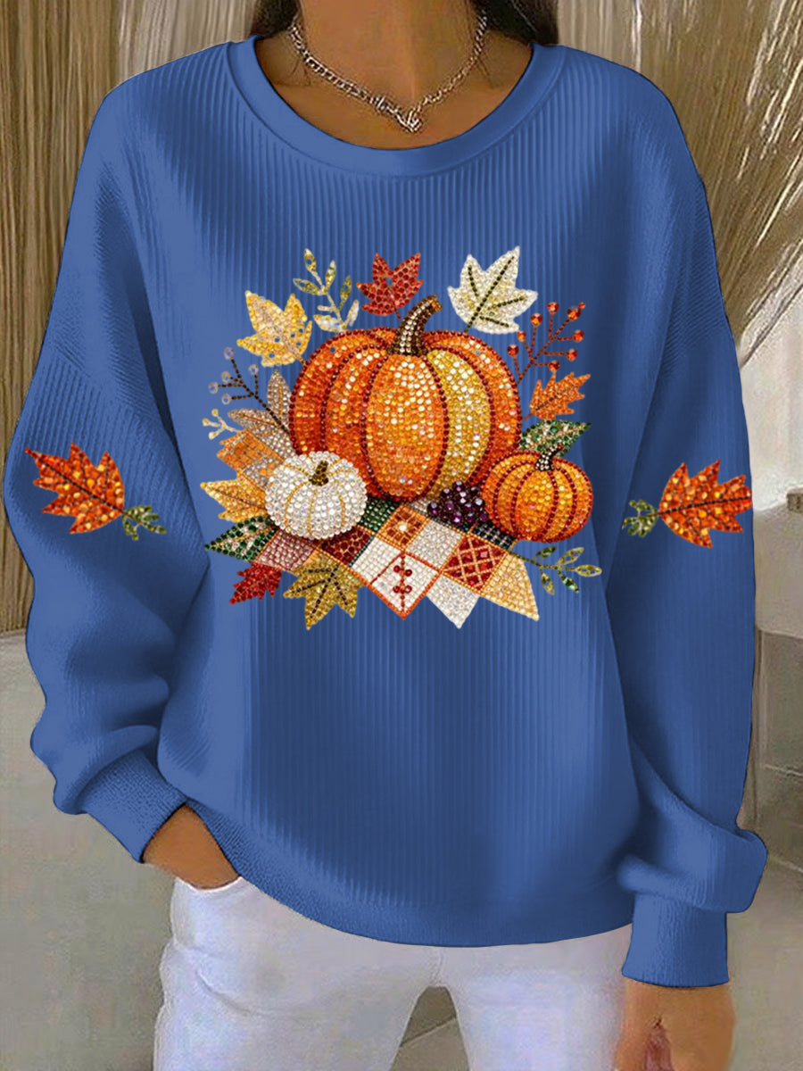 Blue ribbed women's sweatshirt with fall pumpkin graphic and leaf accents