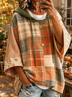 Women's patchwork print hoodie with green plaid and orange panels, front pocket, hood