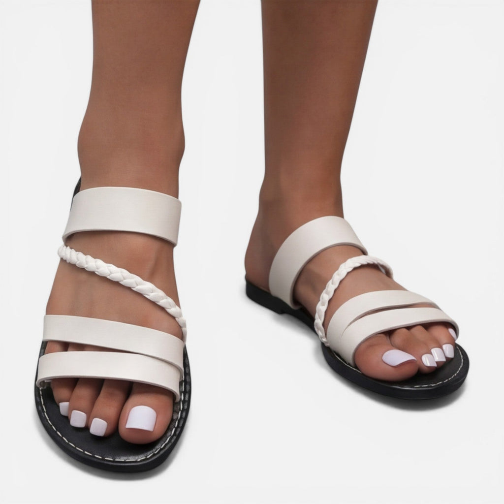 Women’s white leather strap flat sandals with braided side cord and toe loop
