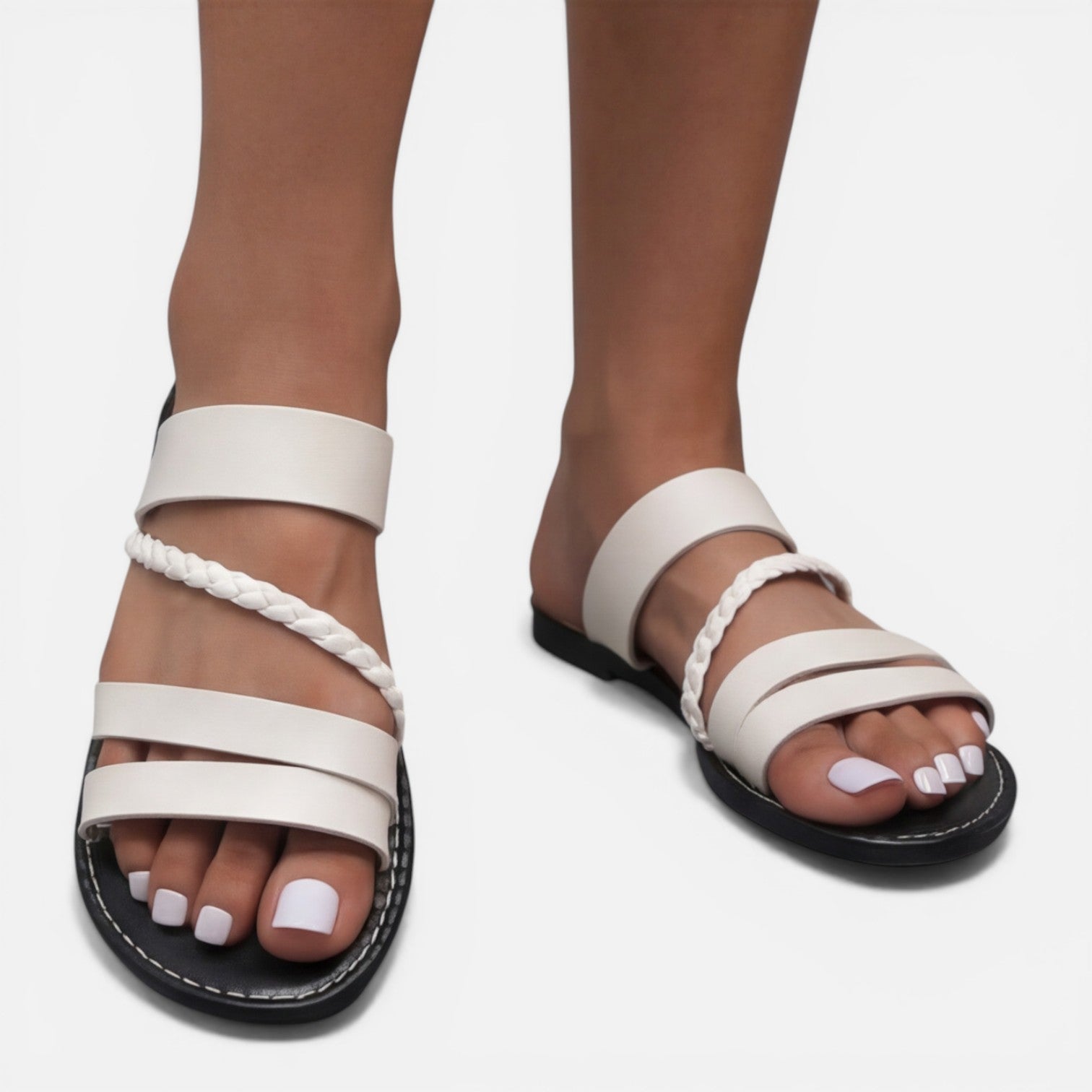 Women’s white leather strap flat sandals with braided side cord and toe loop