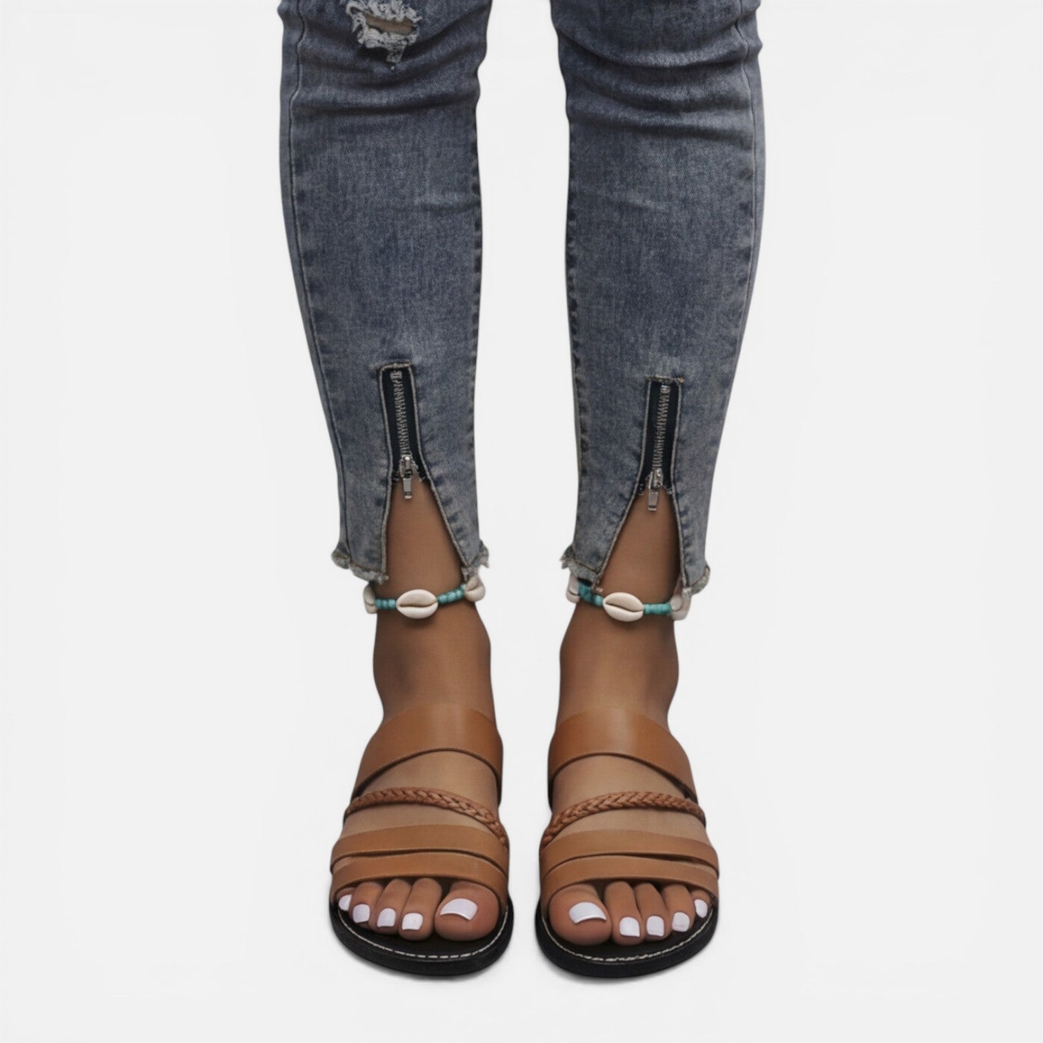 Women’s brown leather strap flat sandals with layered bands and braided toe strap detail