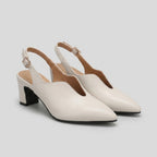 White pointed toe slingback sandals with black block heel
