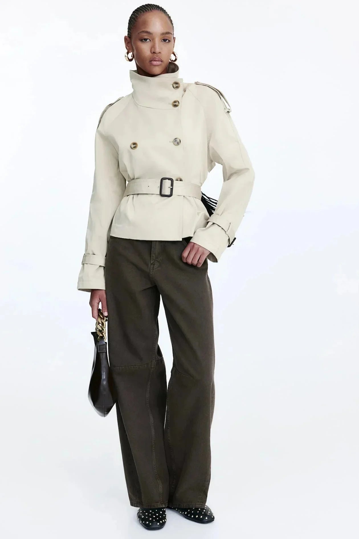 Light beige trench coat with stand-up collar and tied waist belt, double-breasted