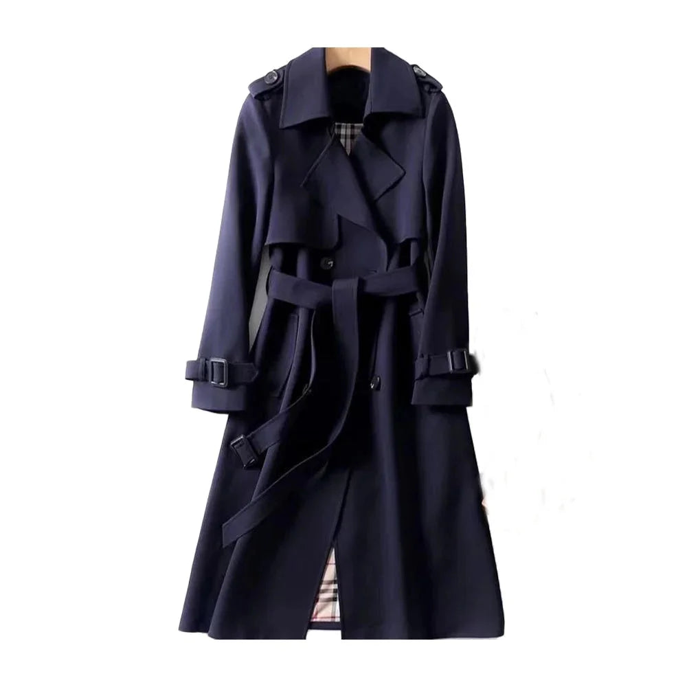 Women’s long trench coat with belt and lapels in navy blue, plaid lining visible.