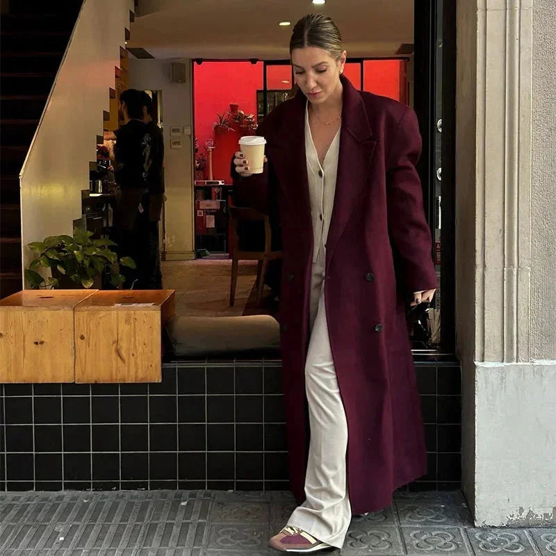Burgundy long oversized trench coat with wide lapels and button front